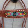E1062D60 27D9 4FCF B57C 3E52676AEE93 Headstall with tooling and beaded Inlay